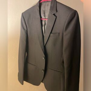 Brand new black blazer for office wear or pair it with a sexy see thru dress.